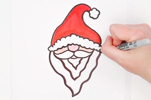 Black outlines drawn on Santa design